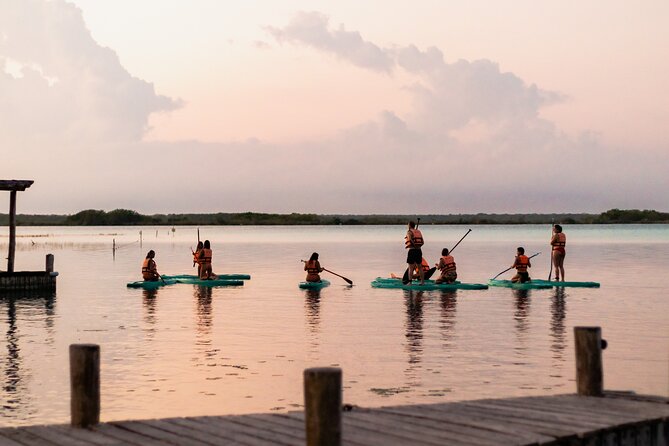 Paddleboarding and/or kayaking tour at sunrise in the lagoon of Bacalar - The lagoon before sunrise: calm water, fast focus, and your balance plan