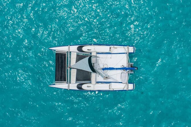 Premium Isla Mujeres Tour by Private Catamaran - Price and value: $950 for up to 14 people, plus two real extras