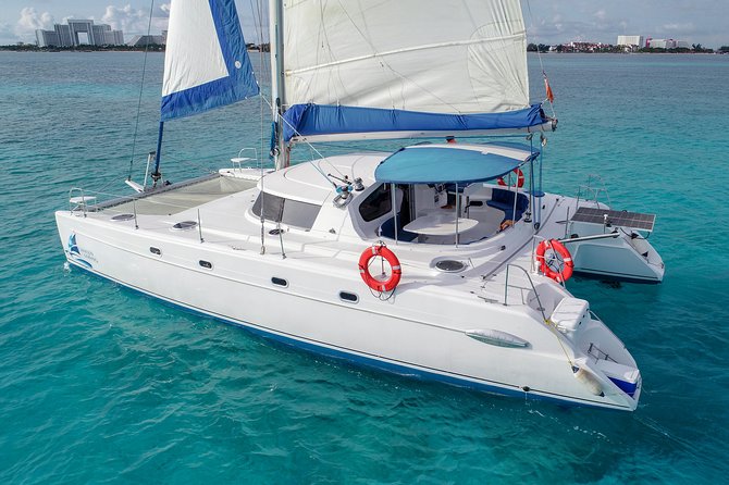 Private Catamaran from Cancun to Isla Mujeres | For up to 30 pp - Stop 1: Museo Subacuatico de Arte and Manchones reef snorkeling
