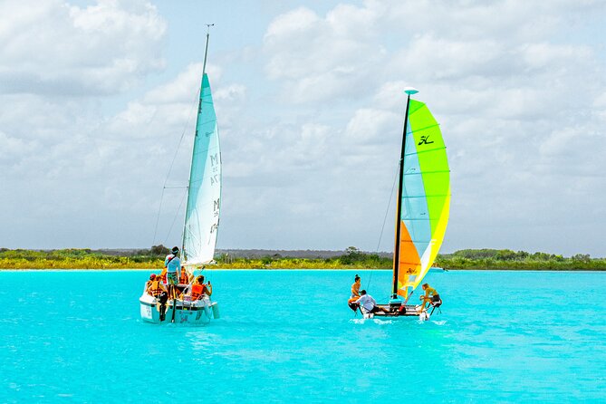 Private Eco-Tour on a Recreational Catamaran with Kayaks Included - A quiet, private catamaran feel on Bacalar’s Lagoon of Seven Colors