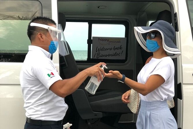 Private Roundtrip Transportation from Cancun Airport to Ferry Isla Mujeres - Finding Your Greeter at Cancun International Airport, Green Shirt Included