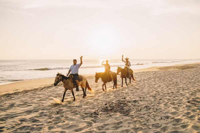 Puerto Escondido: Sunset Horse Back Riding Tour - Puerto Suelo Beach bonfire, marshmallows, and local stories at dusk