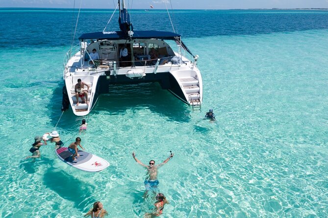 Puerto Morelos Secret Sandbar Catamaran Sail - Jump-off swimming and paddle boards at the sandbar
