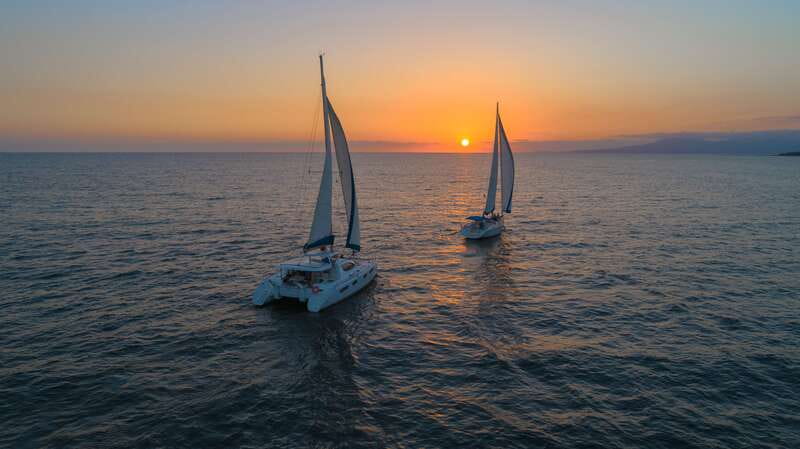 Puerto Vallarta: Bay of Banderas Luxury Sunset Sailing Tour - Onboard comfort: cushions, breeze, and one seating warning