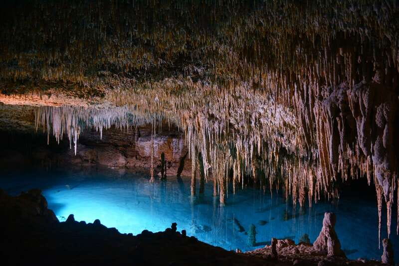 Rio Secreto Nature Reserve: Bicycle, Rappel & Ziplines Tour - Walking the caves beside the underground river