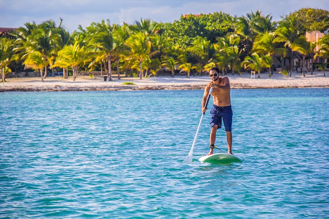 Riviera Maya Luxury Snorkeling Cruise with Lunch and Drinks - Open bar, lunch, and the crew vibe on deck