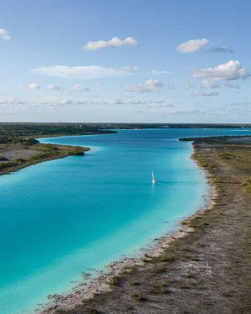Sailboat tour in the seven colors lagoon of Bacalar - Cenote Negra and Cenote Esmeralda inside the lagoon