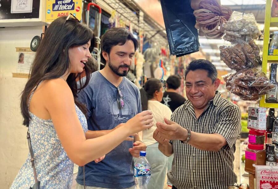 Street Food Walking Tour in Merida - The market spread: panuchos, salbutes, chicharrón, and cochinita pibil