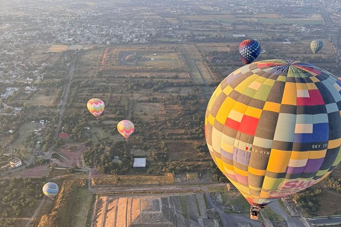 Sunrise Balloon Flight over Teotihuacan and Breakfast in Cueva - Ancestral Drinks Tasting and the Silver and Obsidian Workshop