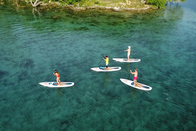 Sunrise on Paddleboard with breakfast in the lagoon of 7 colors - Why Sunrise Paddleboarding in Bacalar Feels Different