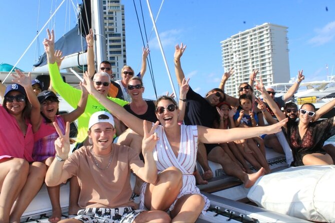 Top Isla Mujeres Catamaran Tour with Snorkel Open Bar and Buffet lunch - From hotel pickup to catamaran boarding: where the day starts