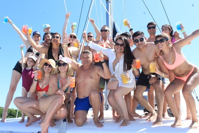 Top Isla Mujeres Catamaran Tour with Snorkel Open Bar and Buffet lunch - Sailing out of Cancún: drinks, music, and a fun start