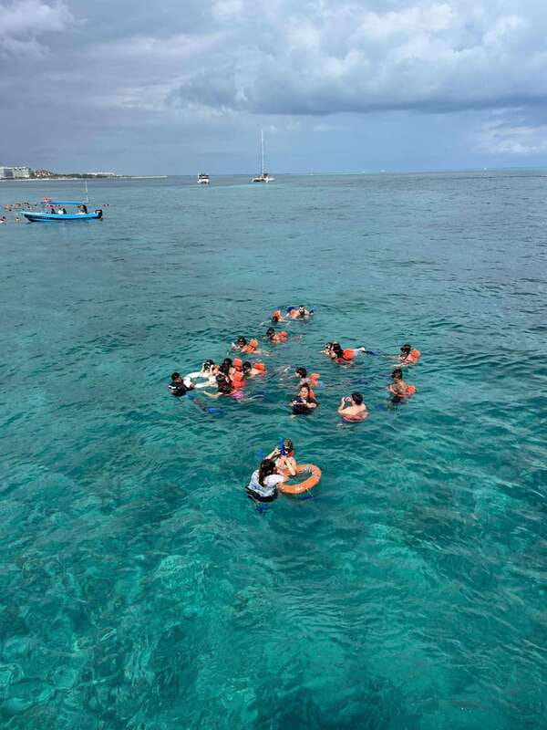 Tour Isla Mujeres: From Cancún-Riviera Maya all Included - North Beach Swim Time and Isla Mujeres Center for Shopping