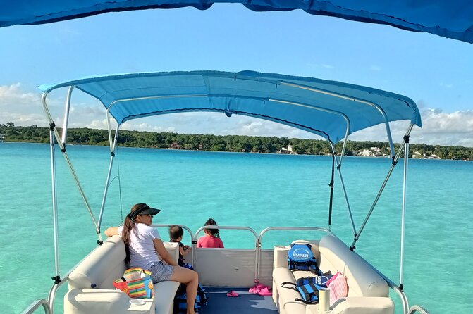 Tour of the Lagoon of Bacalar on pontoon -Collective- - Stop-by-stop: lagoon color, cenotes, birds, and pirate-channel swimming
