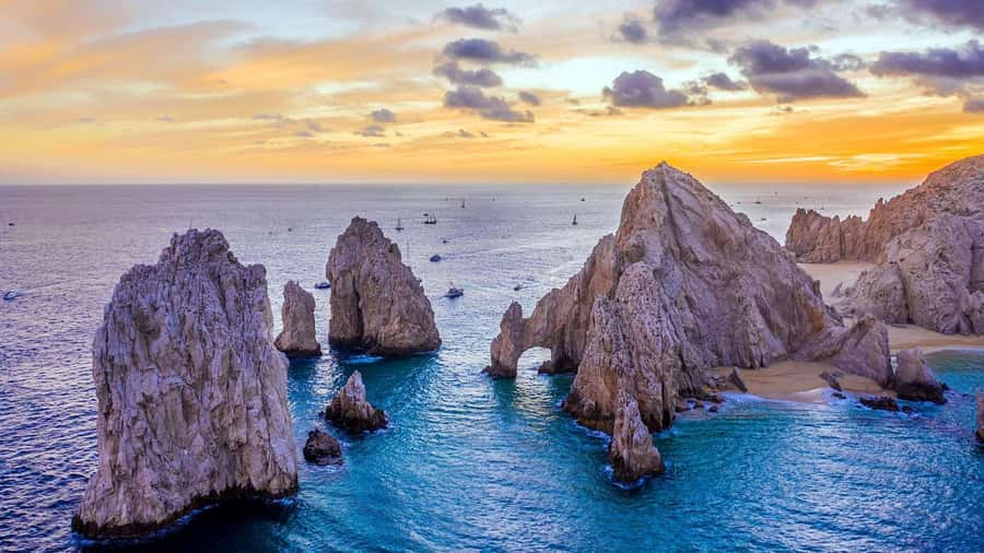 Tour the Arch of Cabo San Lucas and head down to Playa del Amor - Land’s End formations: Pelican Rock, Neptune’s Finger, and the Window to the Pacific