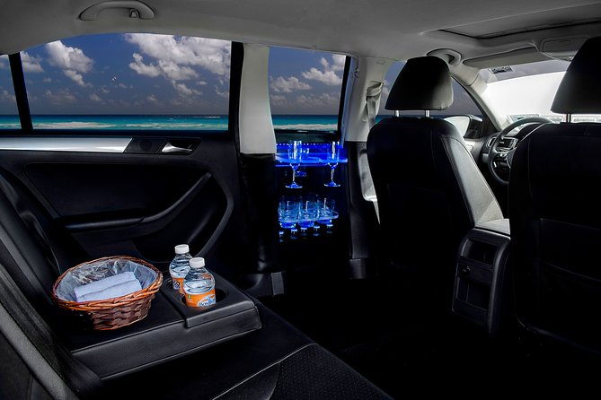 Transfers in Luxury Sedan from Cancun Airport - Luxury Sedan Comfort, Cooling Touches, and On-Route Extras