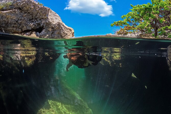 Tulum Guided Tour, Magical Cenote, Lagoon Snorkeling and Beachside Lunch - Tulum Archaeological Site: a cliff-top ruins walk with a free wander